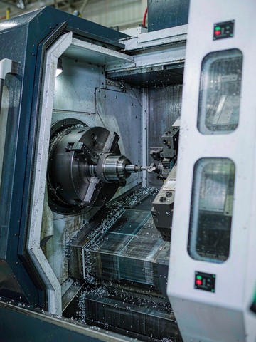 Five axis CNC machining an aluminum robot arm housing on a Mazak VARIAXIS style machining center