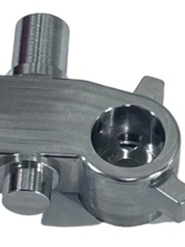 Machined ankle bidirectional shaft sections after quench and temper, showing black oxide finish