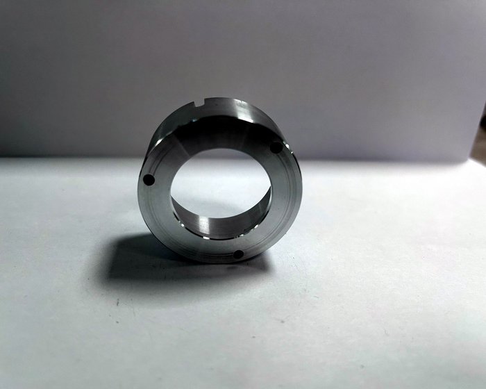 An aluminum housing ring sample for a device assembly, anodizing-ready with all edges chamfered on the machine.