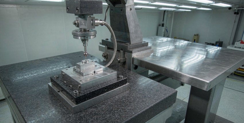 CMM verification of a titanium medical component. Every critical dimension is measured and recorded against the drawing.