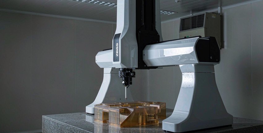 CMM verification of a PEI part in a temperature-controlled inspection room. Dimensional confidence in ULTEM comes from thermal discipline as much as from the toolpath.