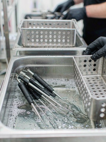 Ultrasonic cleaning stainless steel medical components before clean packaging