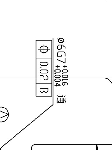 Detail of a feature control frame on a machining drawing showing a 0.02 mm position zone applied to a 6.7 mm hole and referenced to datum B