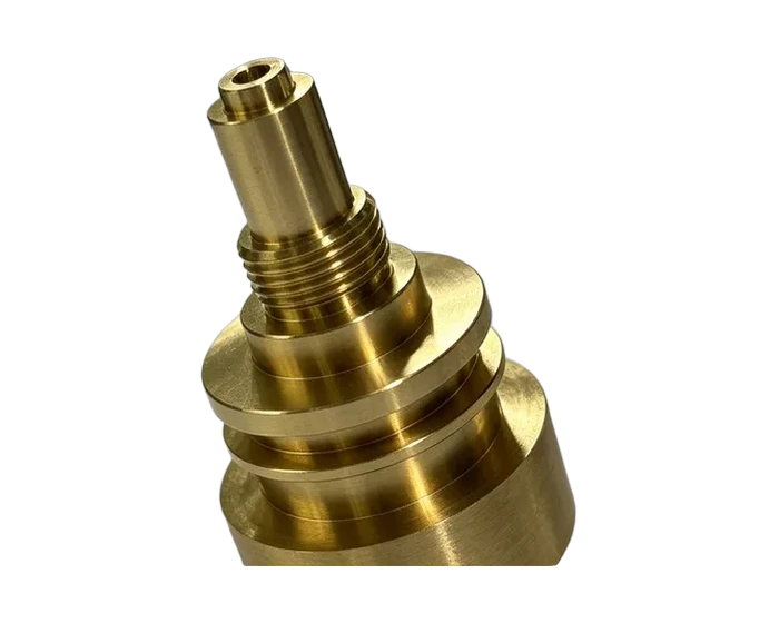 Brass flow control adapter, full profile on machining table