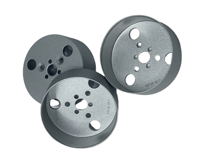 Perforated cylinder end cap, reverse face and pilot bore